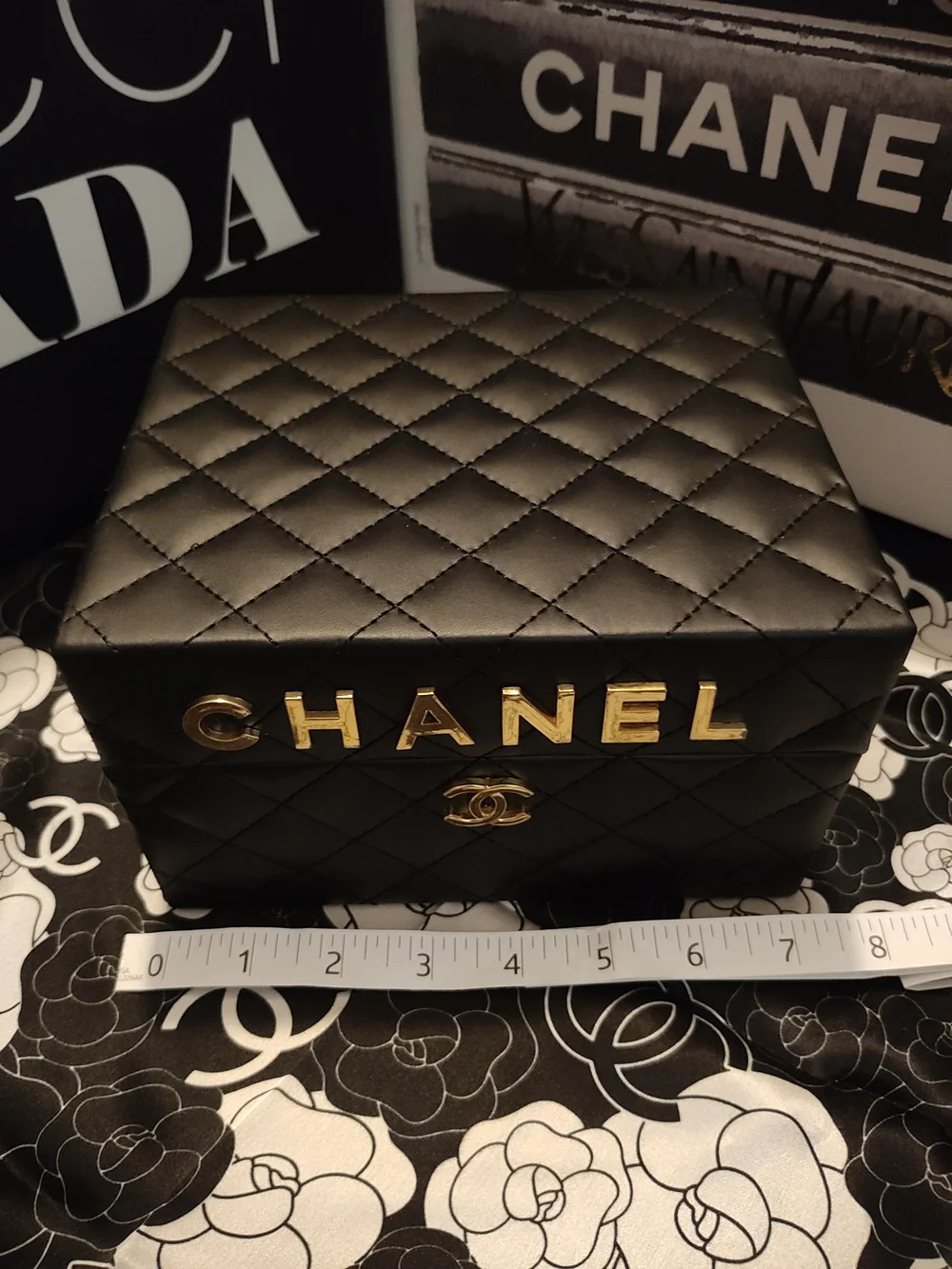 Black Quilted Jewelry Case with Gold Logo Accents And Mirror